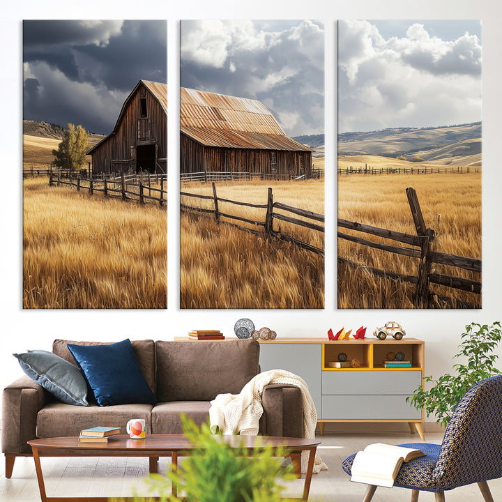 Canvas of a weathered wooden barn in a golden field under a dramatic sky, perfect for rustic or farmhouse-style wall decor.