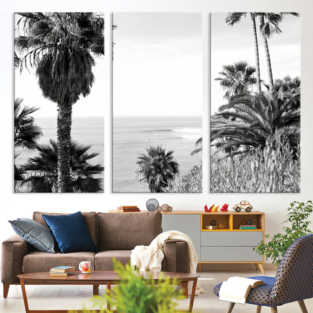 Monochrome canvas of palm trees framing a coastal surf scene, perfect for California-inspired or retro black-and-white beach decor.