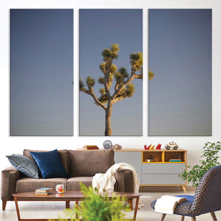 A lone Joshua Tree standing against a deep blue sky, capturing the serene and rugged beauty of the Southwestern desert landscape.