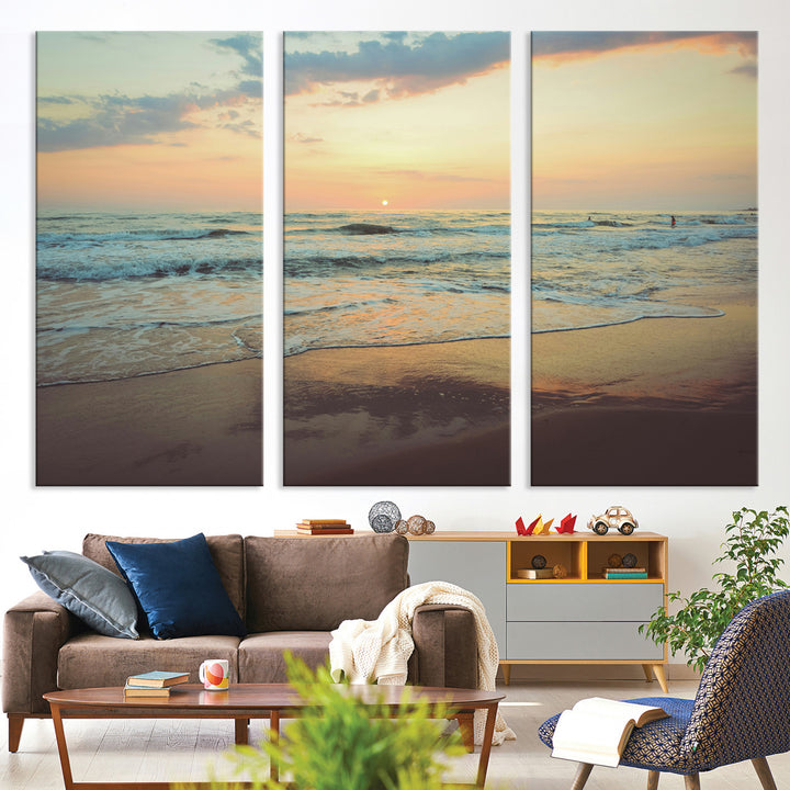Warm sunset over gentle ocean waves with pastel sky and reflections on wet sand, creating a calm and soothing beach ambiance.