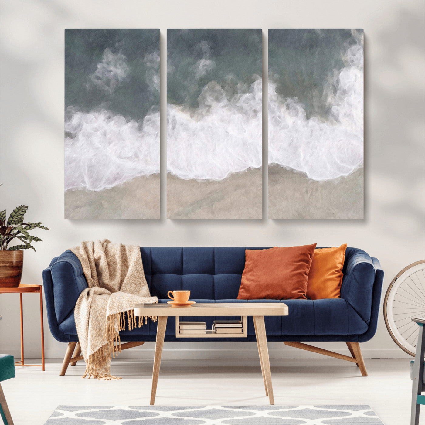 Wall art canvas print featuring foamy ocean waves softly rolling onto a sandy shore with a dreamy, painterly texture.