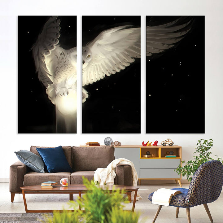 The Night Owl Art graces the wall with its depiction of a snowy owl on a glowing orb, perfect for modern decor.