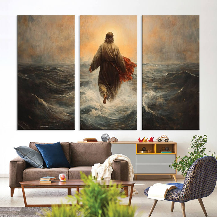 A modern living room is adorned with a triptych titled "Jesus Walking on Water, Christian Wall Art, Jesus Christ Walking on Oil Painting Style Print." The artwork, presented on museum-quality canvas, showcases vibrant colors and exquisite detail.