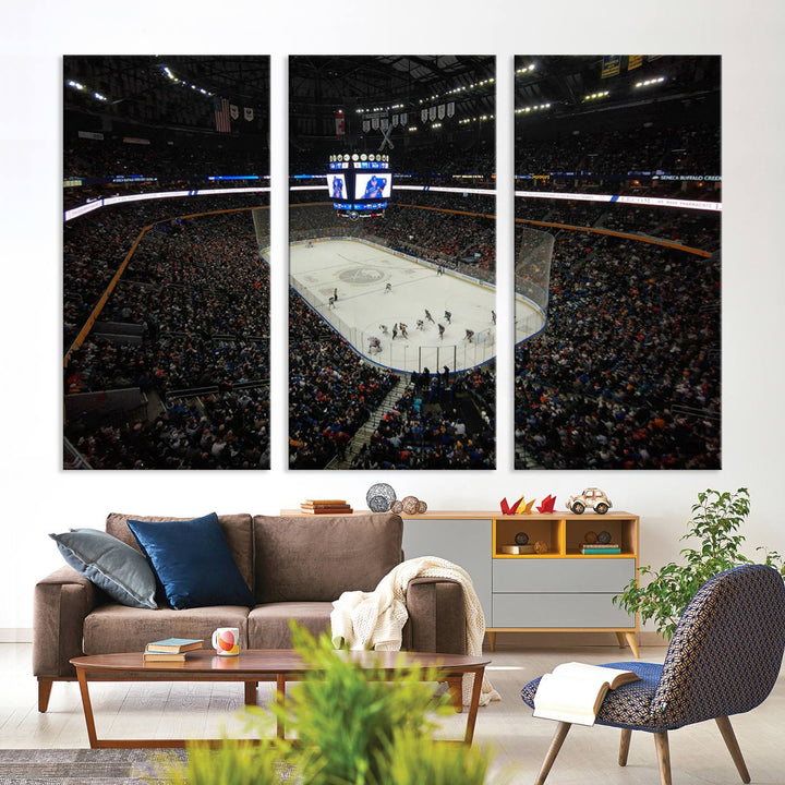 The nautical-themed room is enhanced by the KeyBank Center New York Buffalo Sabres Hockey Stadium Wall Art Canvas Print, a three-panel depiction of a bustling hockey arena with a gallery-quality finish. This canvas artwork, handmade in the USA, introduces an element of sporting elegance to your decor.