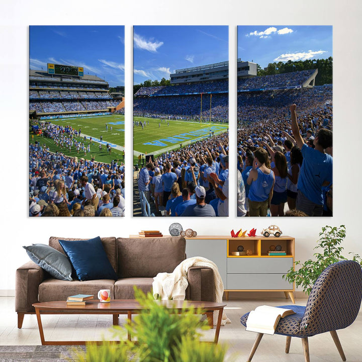 A gallery-quality canvas wall art print featuring the University of North Carolina Tar Heels Football Team and Chapel Hill's Kenan Memorial Stadium adorns the cafe wall.