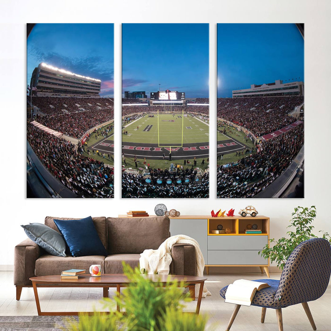 The wall art in the living room features a Texas Tech Red Raiders Football Team Print, showcasing Jones AT&T Stadium at dusk.