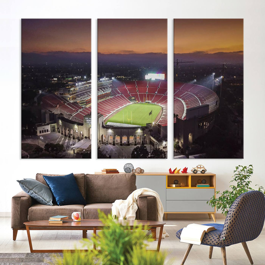 The USC Trojans Stadium canvas captures Memorial Coliseum at twilight, showcasing red seats and a green field beneath an orange sky.