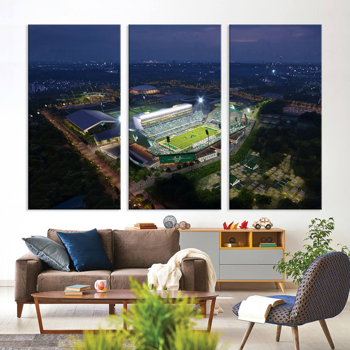 The USF Bulls Football Team Wall Art Canvas Print showcases the Tampa USF Football Stadium at night with city lights.