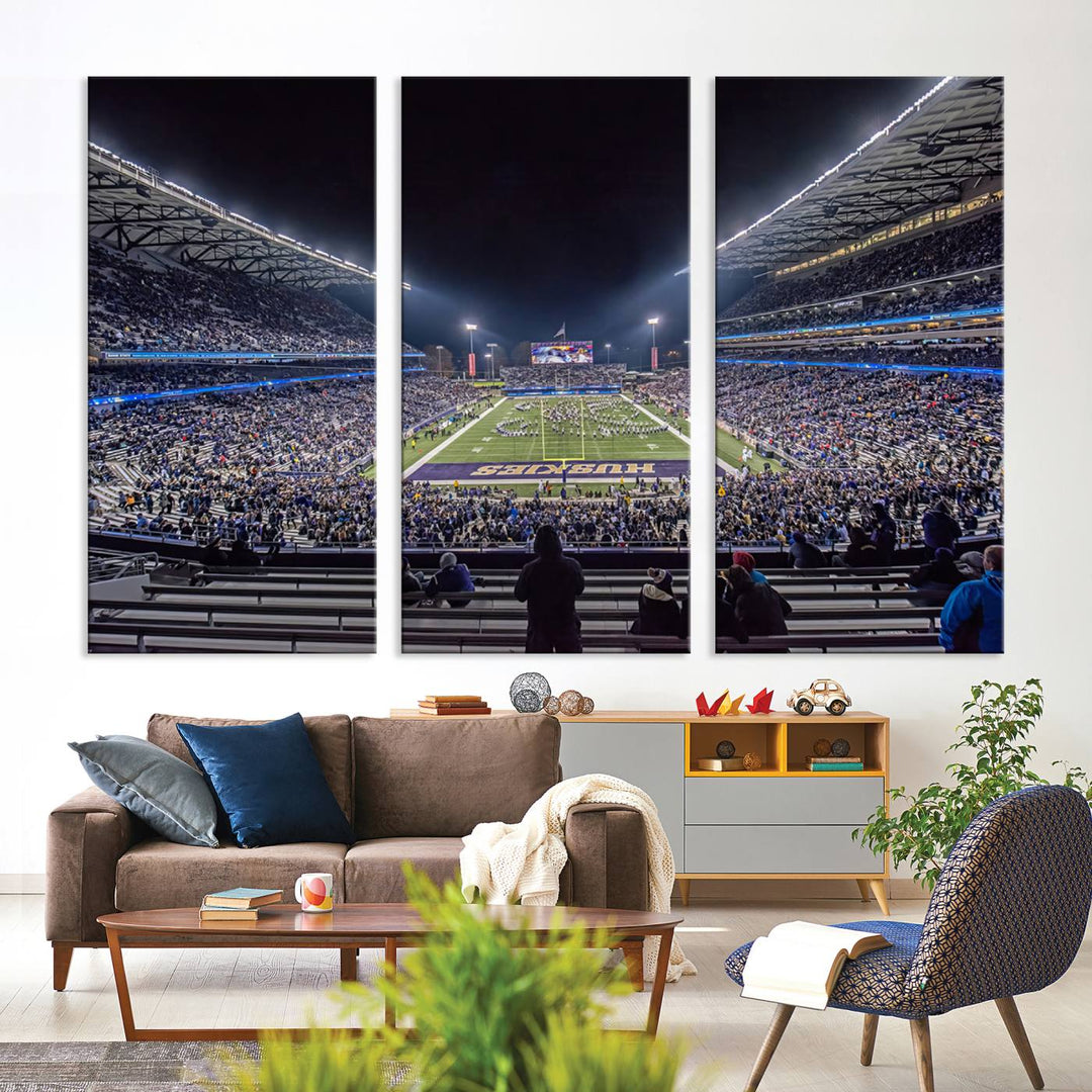 A canvas print titled The University of Washington Huskies Football depicts a packed Husky Stadium at night, as seen from the stands.