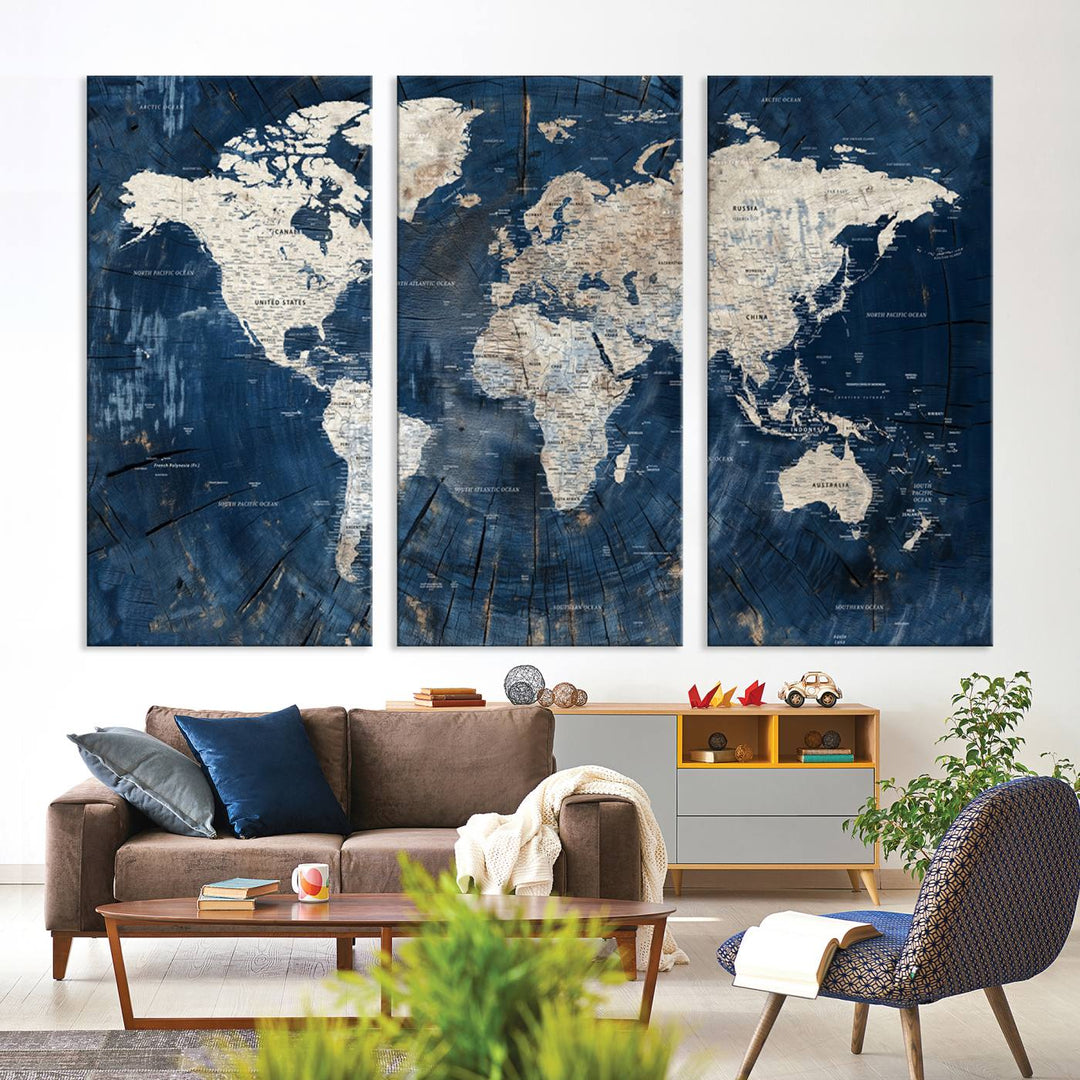 The Rustic World Map Wall Art Canvas Print, featuring a large world map with a vintage blue design on a wood texture, adds an elegant touch to home decor.