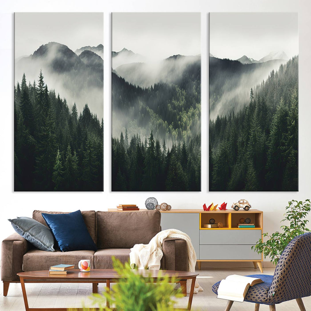 The Misty Forest Canvas Print Wall Art captures a serene misty forest scene with fog and mountains.