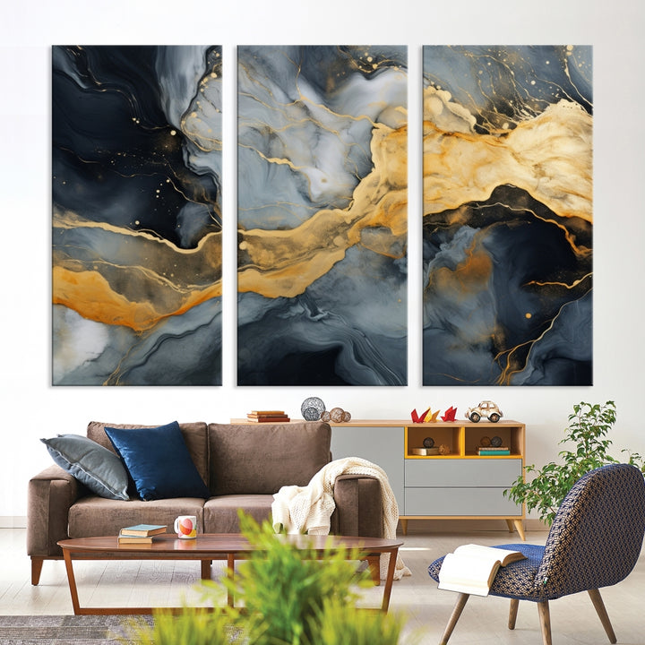 The living room features the Golden Gray Abstract Wall Art Print Contemporary Art Canvas Design, a triptych showcasing gold, black, and gray swirls. Crafted on museum-quality canvas and ready to hang, this piece is designed for elegance and durability.