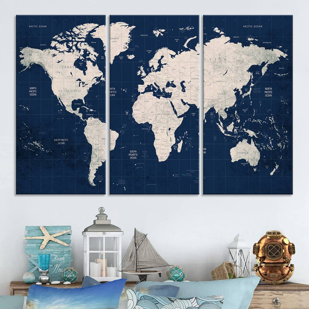 Large modern world map wall art canvas print in beige and navy; showcases a 3-panel vintage map design and is ready to hang.