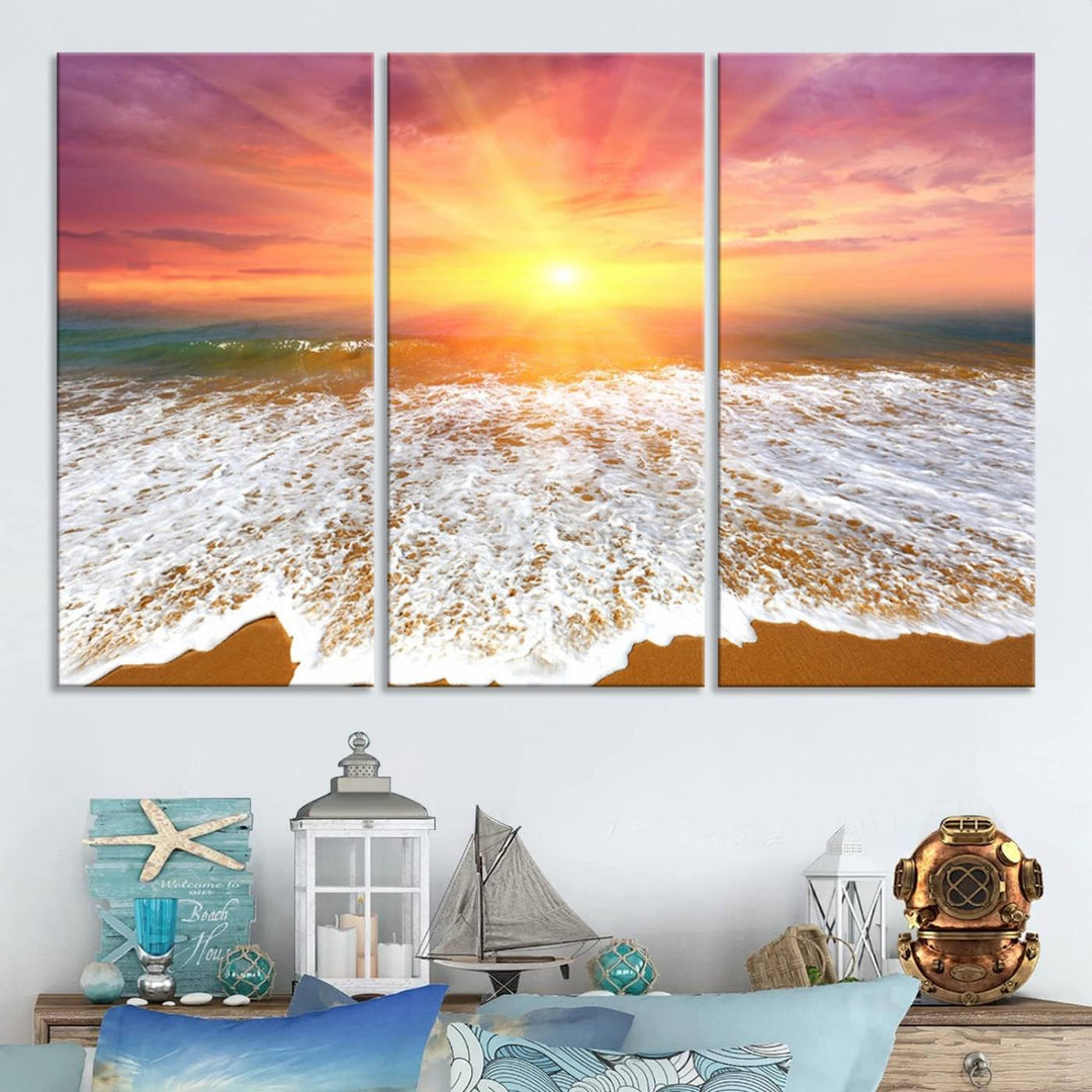 Golden Beach Sunrise 3-panel canvas art of ocean waves, hung on a wooden wall.