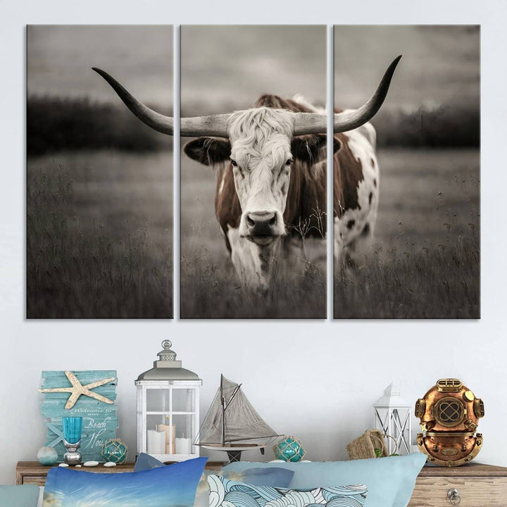 The Texas Longhorn Cow Canvas Wall Art Print adds a rustic touch to a living room.