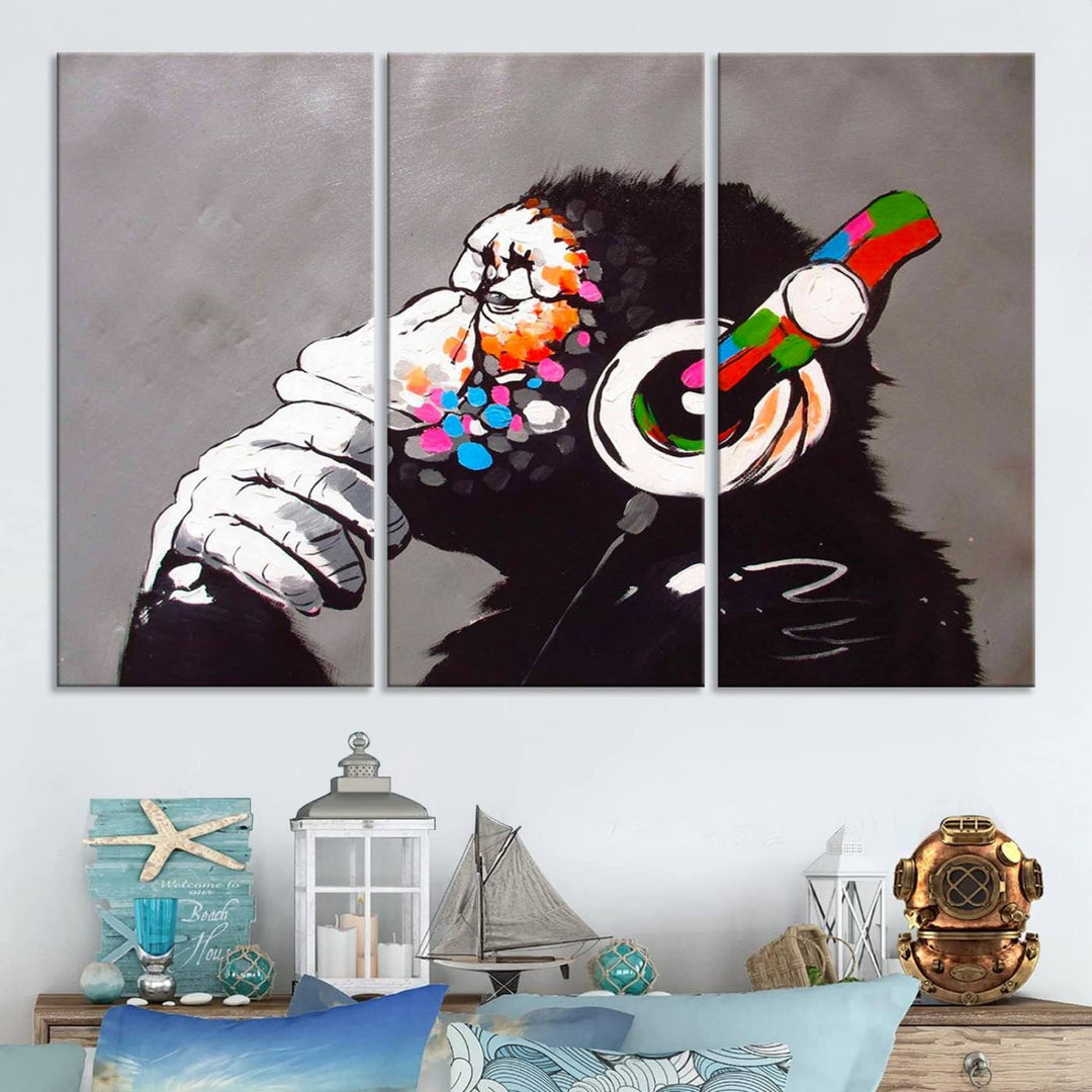 A vibrant triptych, the "DJ Monkey Listening to Music" wall art print, features a Banksy-inspired large canvas adorned with colorful modern pop art. This striking piece elegantly enhances the room with its dynamic and lively depiction.