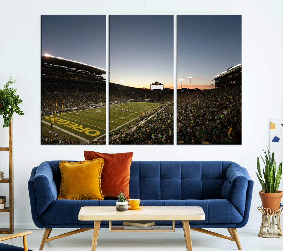 Canvas artwork depicting an Oregon Ducks football game at Autzen Stadium, capturing a sunset and packed stands.