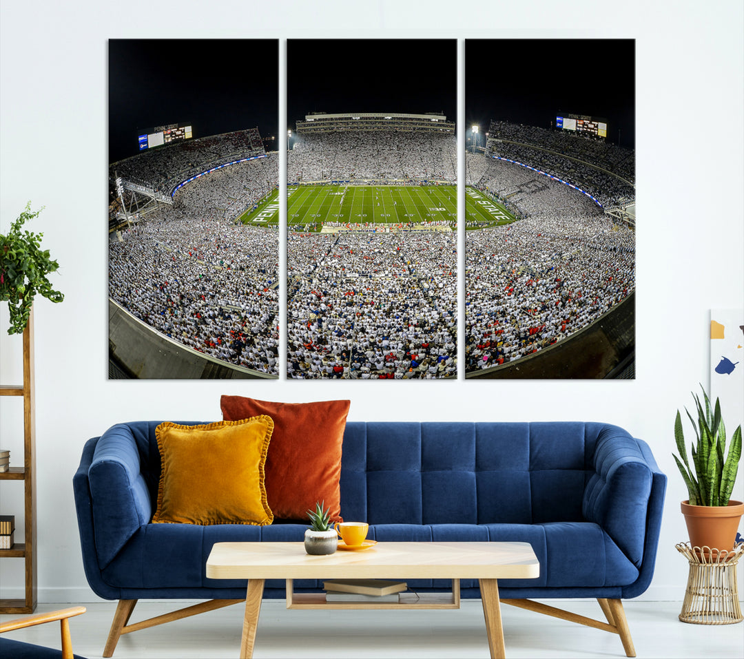 The Beaver Stadium Night Game Triple Canvas Wall Art - Penn State Nittany Lions Football Match features a panoramic view of a packed Beaver Stadium at night.