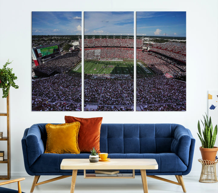 The wall art is a South Carolina Gamecocks print, showcasing Williams-Brice Stadium from a distance under clear skies.