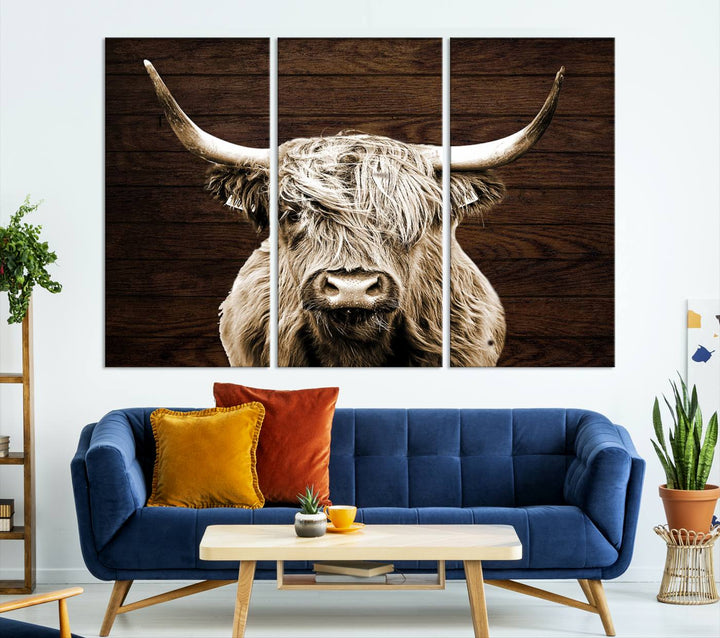 Highland Cow Wall Art Canvas Print: Majestic Scottish bull on rustic decor, ready to hang.