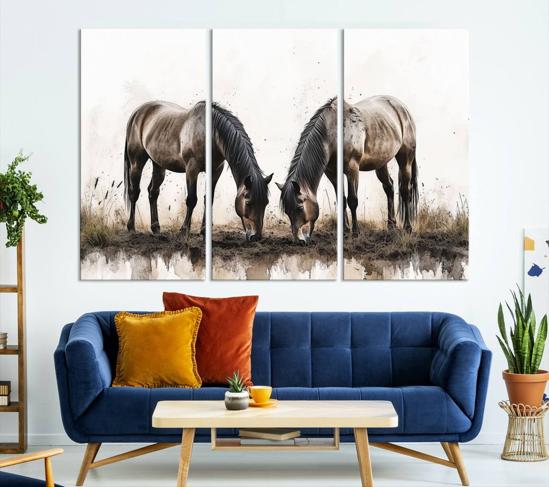 A Chinese Ink Style Horses Wall Art Canvas Print featuring two horses grazing is displayed in a modern setting.