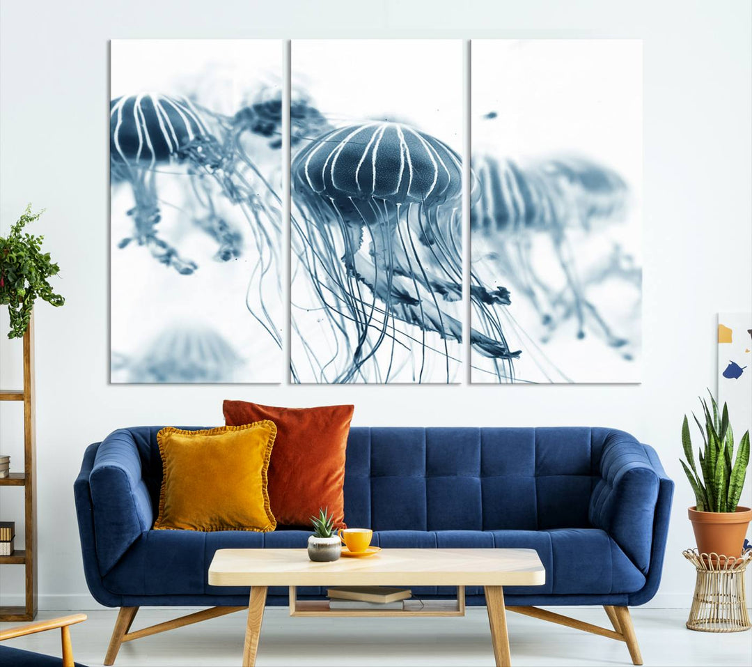 The Abstract Jellyfish Wall Art Canvas Print, a three-panel piece featuring high-resolution printing, hangs elegantly in the room, adding vibrant detail to the space.