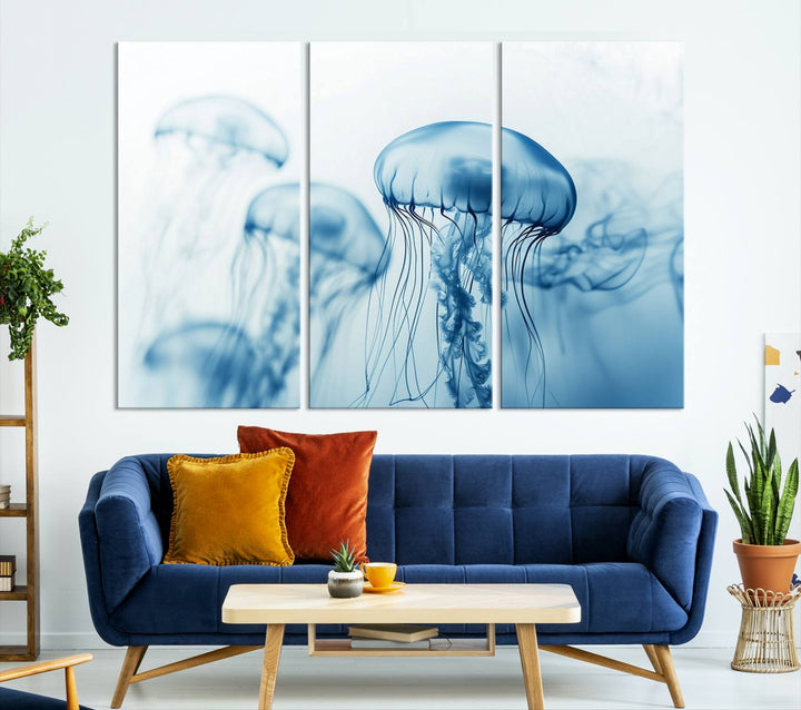 A breathtaking triptych of the Blue Jellyfish Wall Art Canvas Print decorates the space, beautifully highlighted by an overhead lamp. Each canvas is created on museum-quality material using high-resolution printing and includes a UV-protective coating to ensure long-lasting vibrancy.