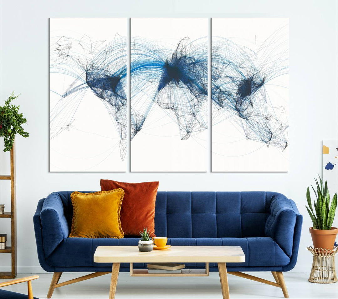 The Aviation Flight Map Wall Art is a set of three abstract panels featuring a world map with blue lines, resembling a flight map. Ideal for aviation enthusiasts, this ready-to-hang framed air traffic art print enhances the appeal of modern decor.