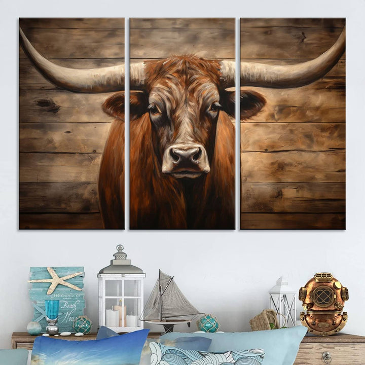 The Longhorn Bull Wall Art, a ready-to-hang canvas print, showcases an image of a brown longhorn cow set against a wooden background, perfect for those looking to enhance their space with rustic farmhouse and western barn decor.