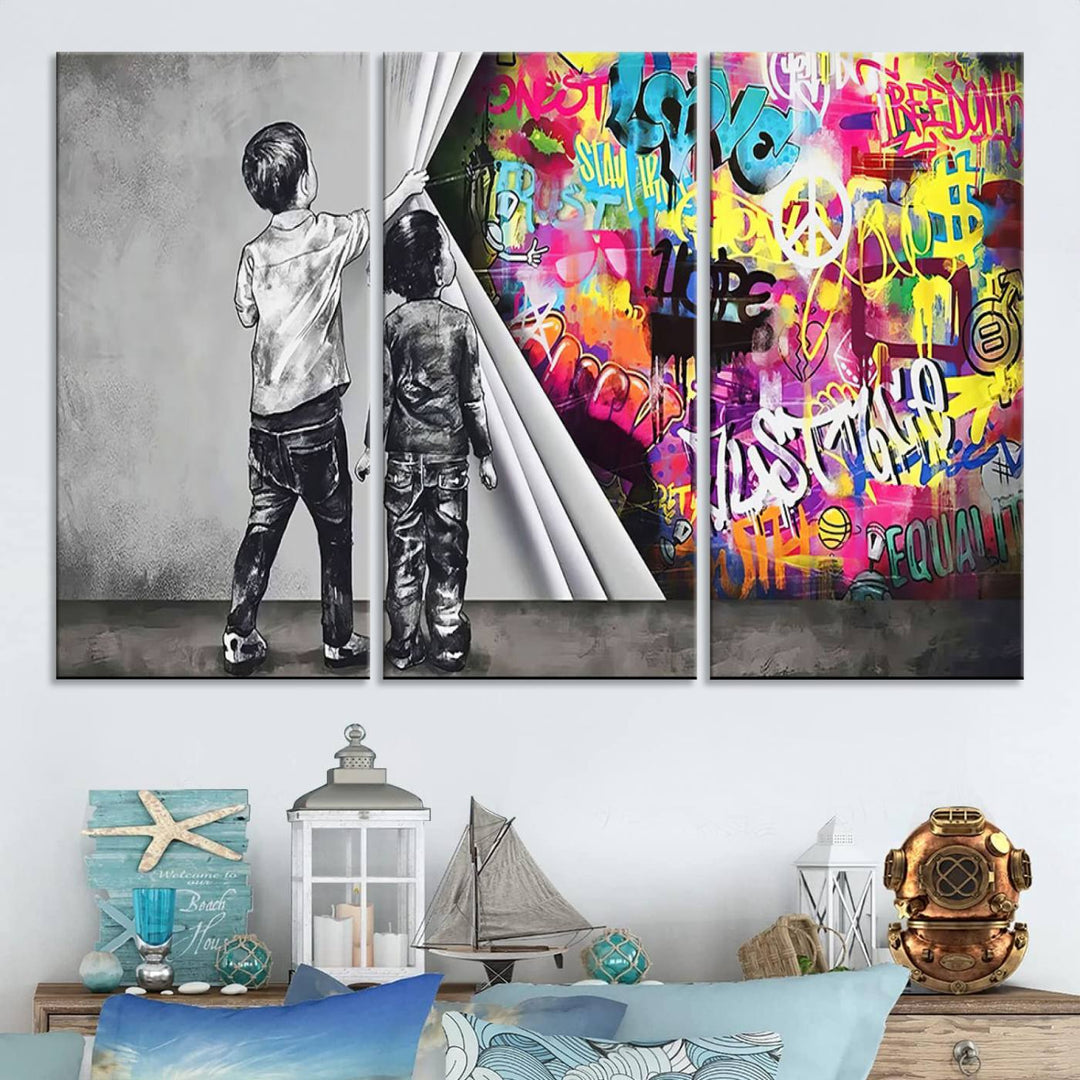 The Banksy Print - Street Art Canvas features a vibrant and bold image of two children lifting a curtain to reveal colorful graffiti. It's ready to hang, adding an urban modern decor vibe.