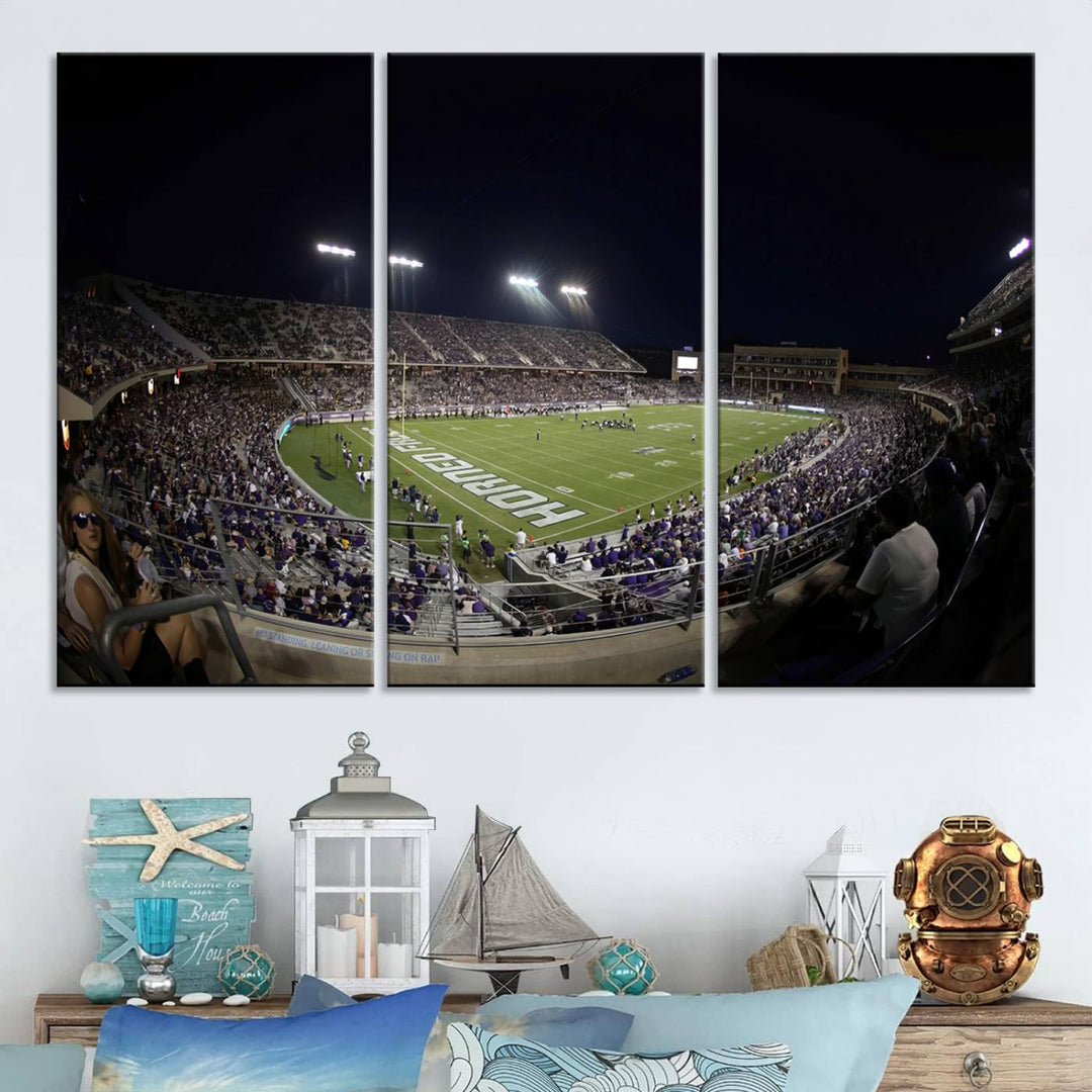 The wall art print features a night view of Amon G. Carter Stadium filled with TCU fans, showcased in the Horned Frogs Football Canvas Wall Art.