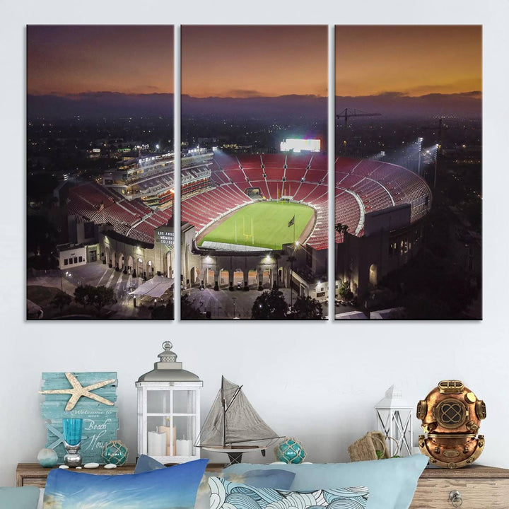 The USC Trojans Stadium canvas captures Memorial Coliseum at twilight, showcasing red seats and a green field beneath an orange sky.