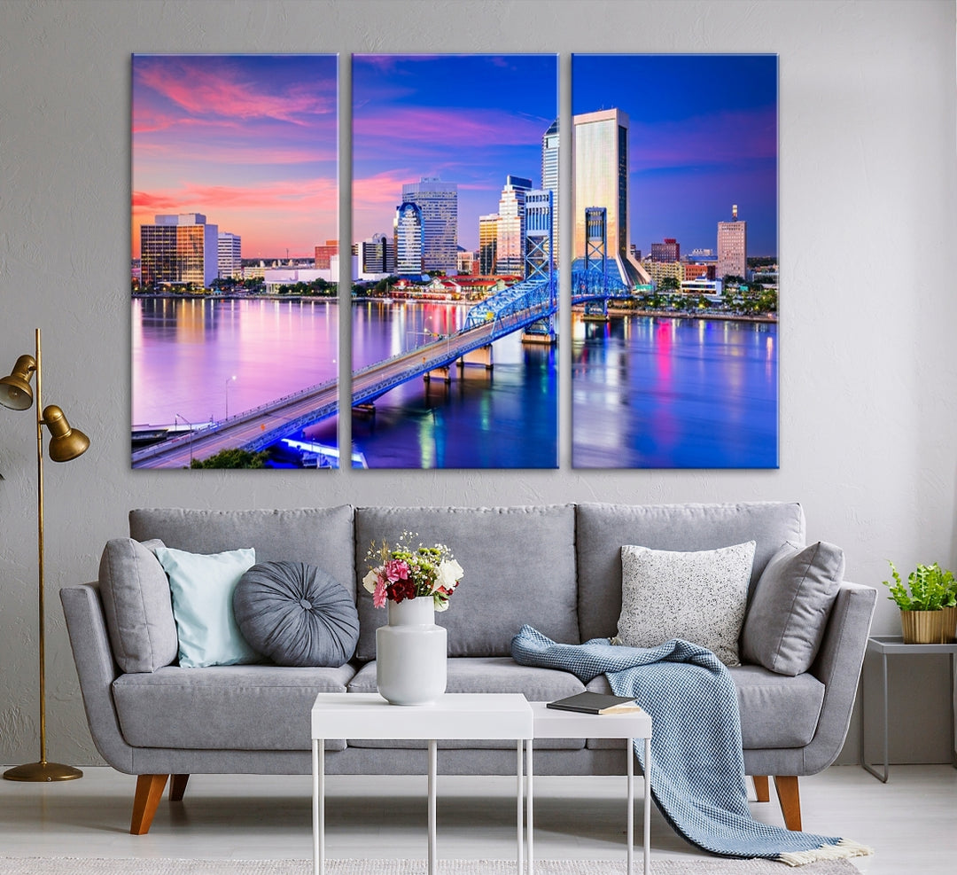 The Jacksonville Wall Art Canvas Print, showcasing the Jacksonville cityscape over a river at sunset, is elegantly crafted on museum-quality canvas with a UV-protective coating. Ready to hang, it elevates your space with its sophisticated charm.