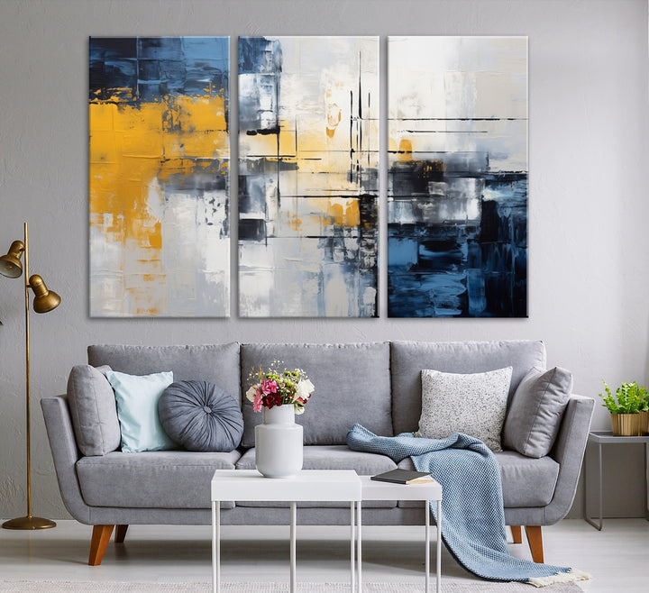 The Yellow Orange Blue Abstract Wall Art Print on gallery-wrapped, museum-quality canvases adds a vibrant touch to the room.