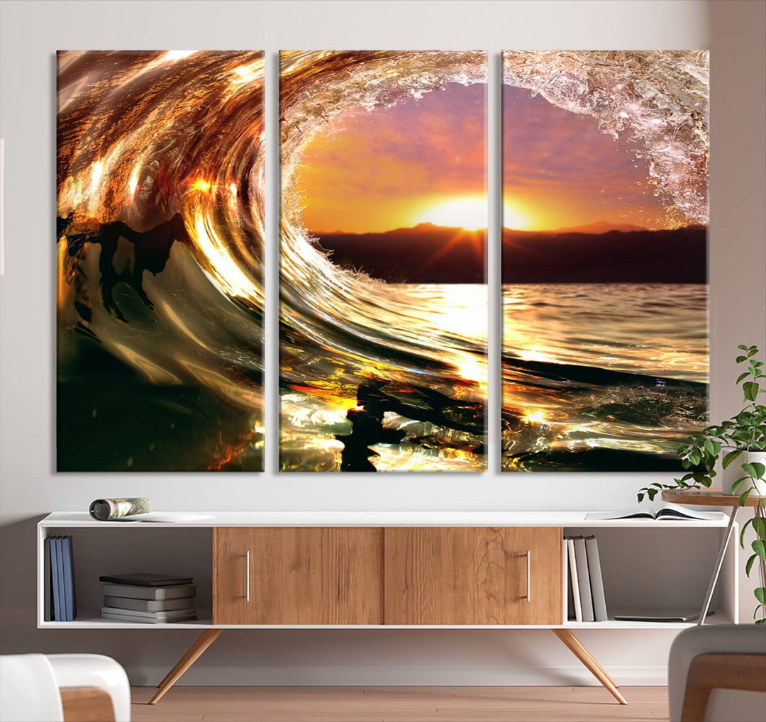 The Golden Wave Sunset Triptych Canvas Art showcases an ocean wave at sunset, casting warm light.