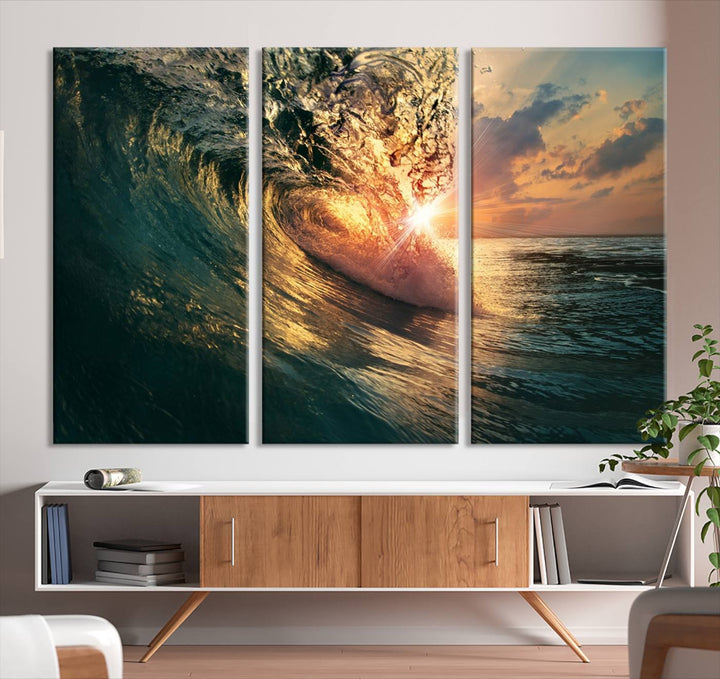 A triptych seascape titled Ocean Wave Sunset Canvas, featuring a stunning ocean view at sunset, is beautifully framed and ready to hang.