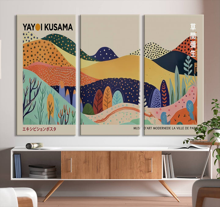 In a living room with contemporary décor, a vibrant abstract landscape by Yayoi Kusama from 1986 is prominently displayed.