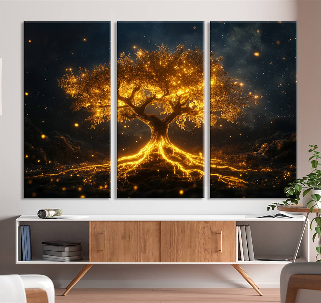 A triptych of the "Golden Tree of Life Canvas Wall Art Print" with its illuminating roots adorns the living room wall, offering a stunning piece of art that brings a touch of nature-inspired elegance to your space.