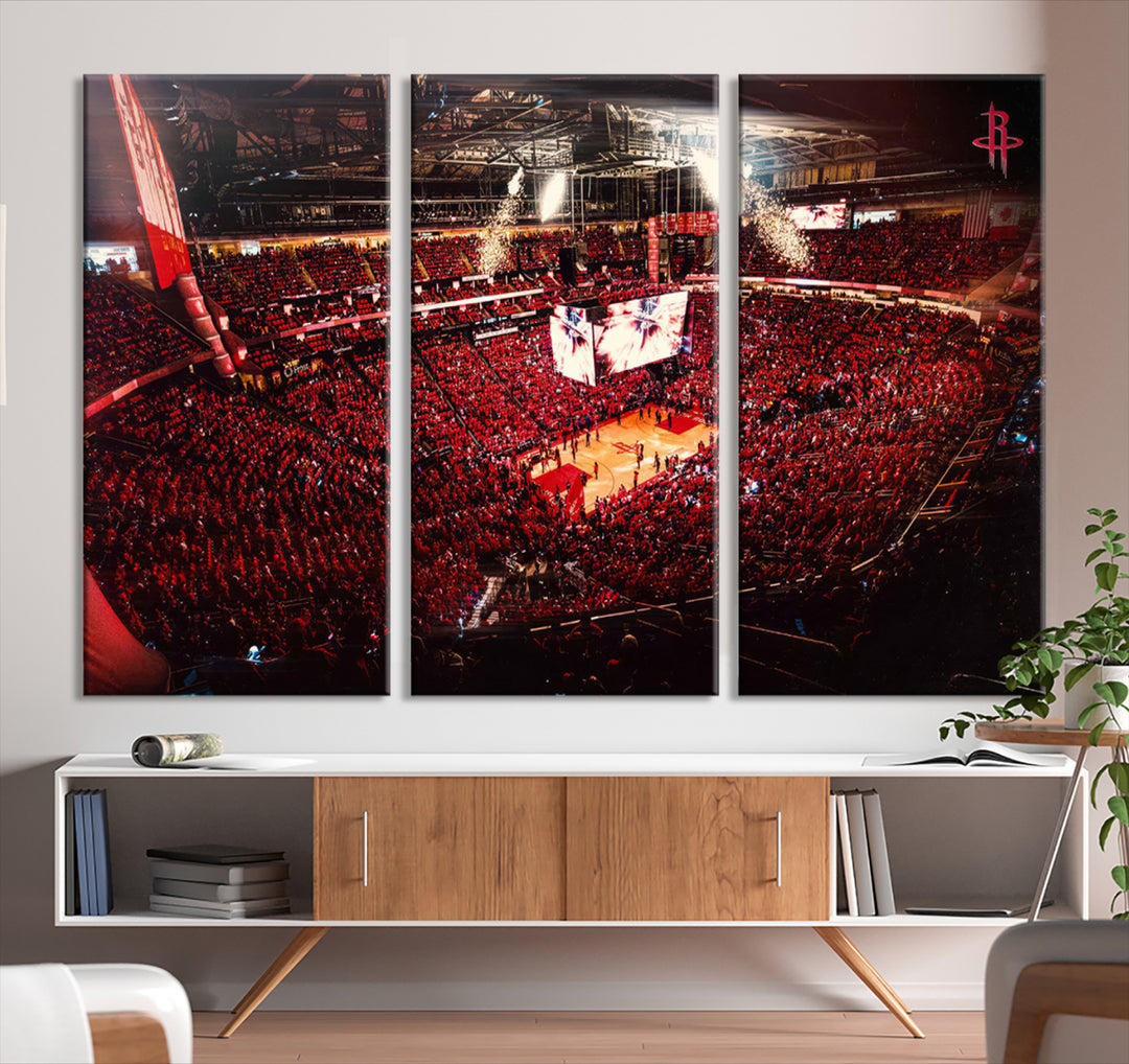 A crowded basketball arena with red lighting hosts a Houston Rockets game.