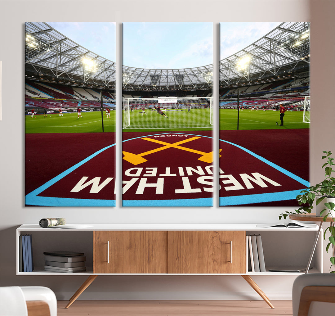 A soccer stadium with the West Ham United FC logo.