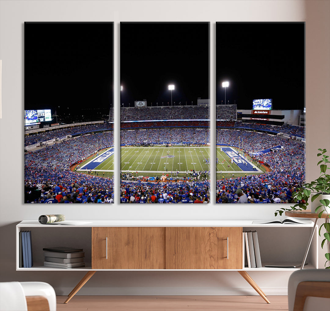 Buffalo Bills Stadium Wall Art depicts a packed football stadium at night, illuminated by bright field lights.