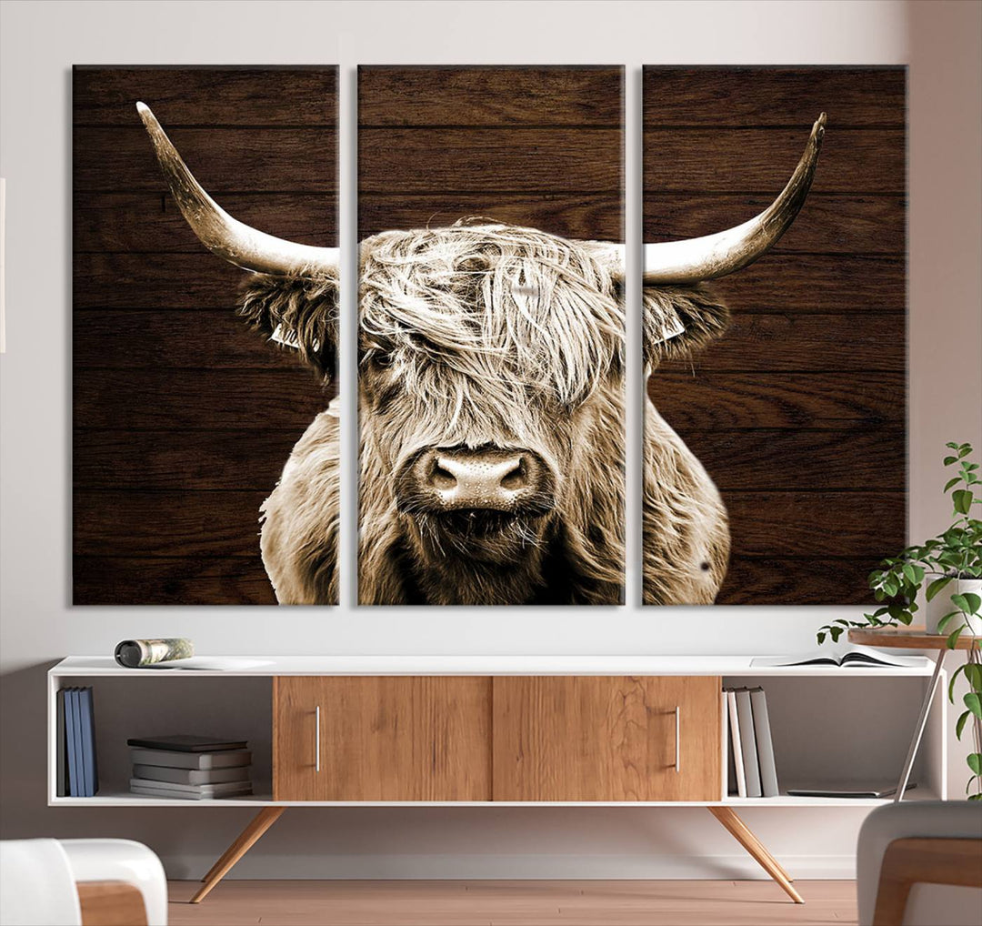 Highland Cow Wall Art Canvas Print: Majestic Scottish bull on rustic decor, ready to hang.