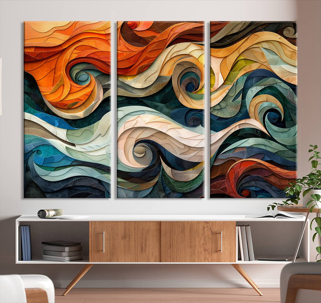 Abstract Wave Wall Art is a ready-to-hang framed canvas print featuring swirling orange, blue, and white patterns. It's perfect for adding vibrant decor to modern spaces.