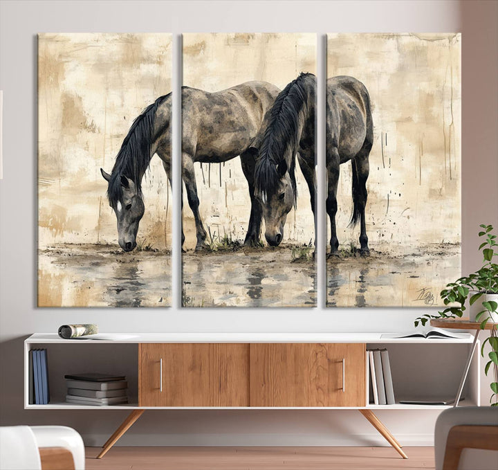 Chines Ink Style Black Horses Wall Art Canvas Print features a triptych painting of two horses drinking at the water's edge.