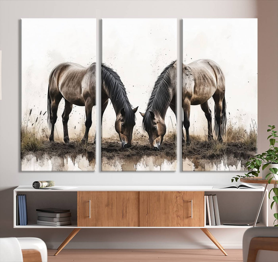 A Chinese Ink Style Horses Wall Art Canvas Print featuring two horses grazing is displayed in a modern setting.