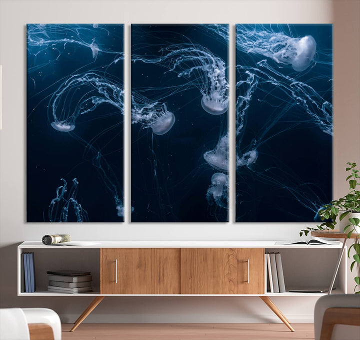 Room with modern decor, featuring the Abstract Jellyfish in Ocean Wall Art Canvas Print on museum-quality canvas.