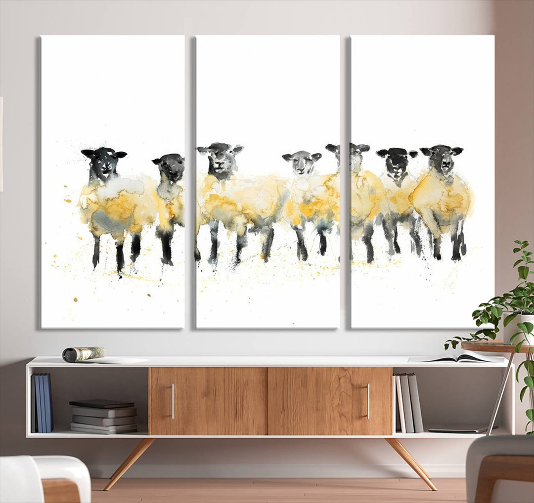 The Farmhouse Wall Art Sheep Print, ready to hang as a framed canvas, adorns the black wall, adding a hint of rustic barn decor.