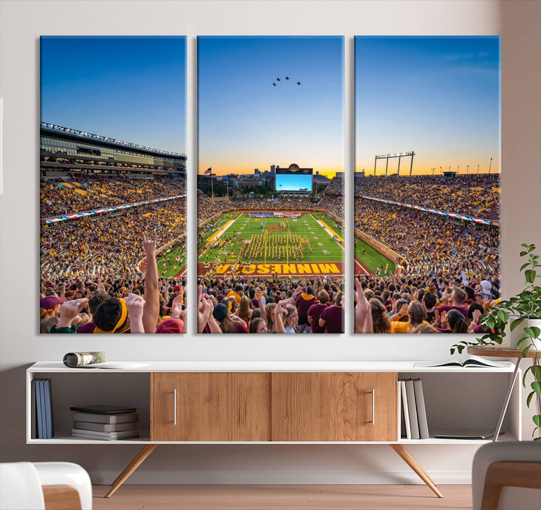 Canvas wall art featuring the University of Minnesota Football Team print, showcasing Huntington Bank Stadium at sunset with jets overhead.