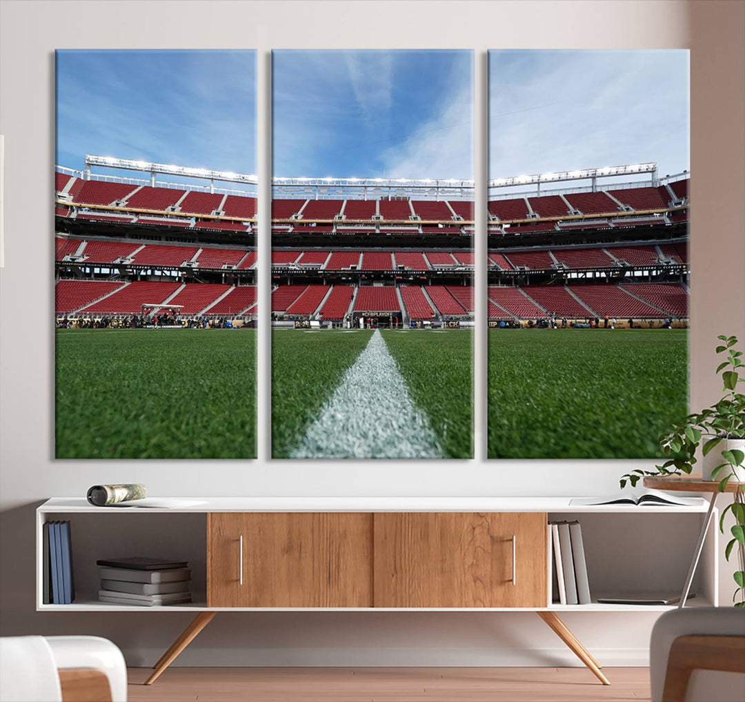 A canvas print of the University of Tulsa Golden Hurricane showcases H.A. Chapman Stadiums football field and red seats against a backdrop of a blue sky.