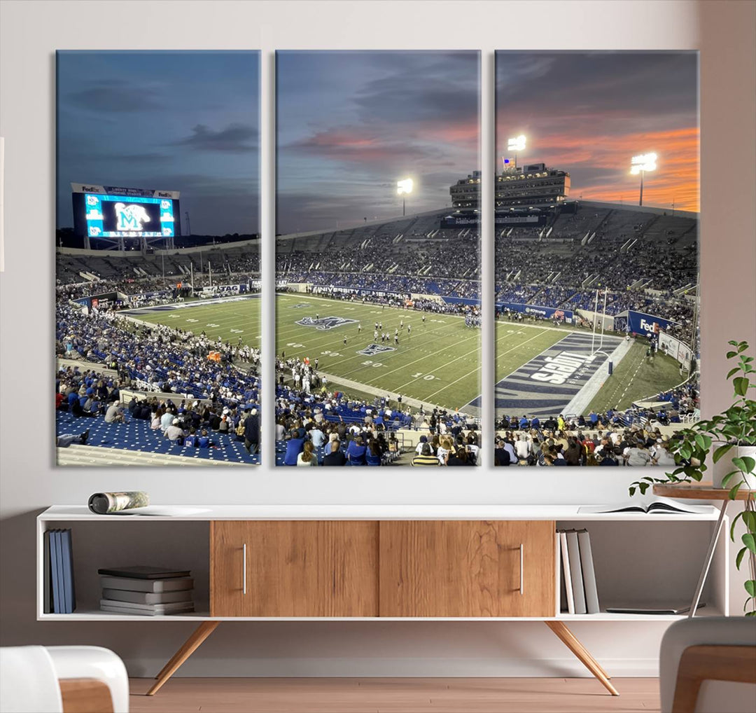 A Memphis Tigers football canvas print of Simmons Bank Liberty Stadium at sunset enhances the living room.